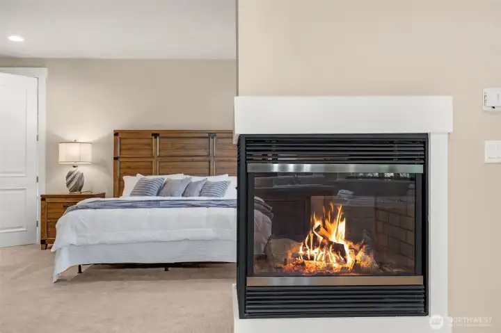 Primary suite with gas fireplace. Primary suite with gas fireplace.