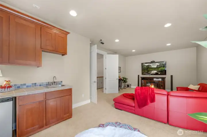 Large media room with wet bar. Large media room with wet bar.