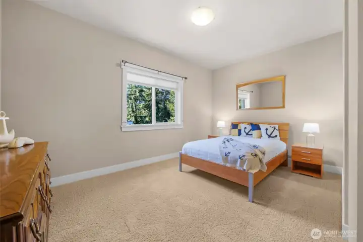 Large 2nd level bedroom with walk-in closet & linen closet. Large 2nd level bedroom with walk-in closet & linen closet.