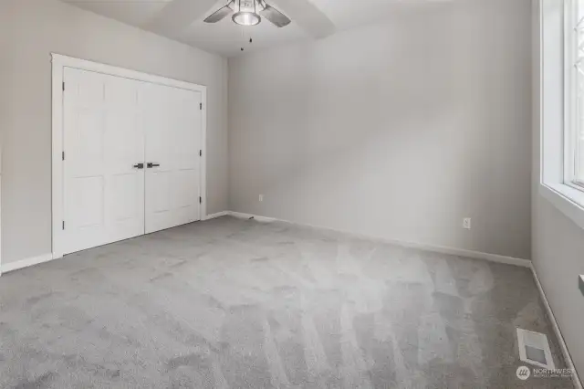 LARGE 3rd bedroom with double closet and storage area.