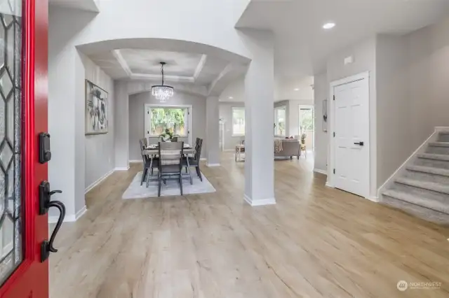 Front entry looking toward dining room. Stairs on right head up to the bonus room.