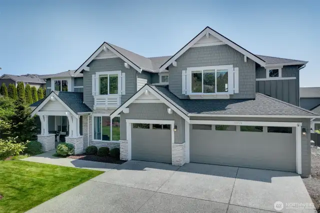 Attractive blend of NW Craftsman and modern design and floorplan.