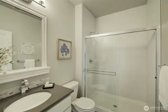 Main floor bath. Attractive tile shower.