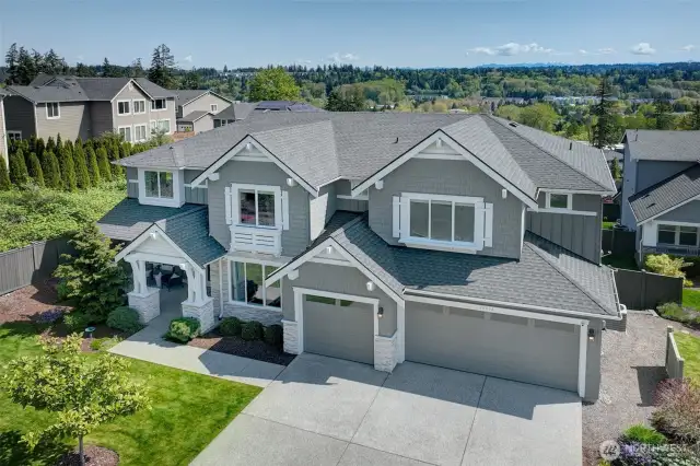 Surrounded by other attractive homes and nice landscaping.