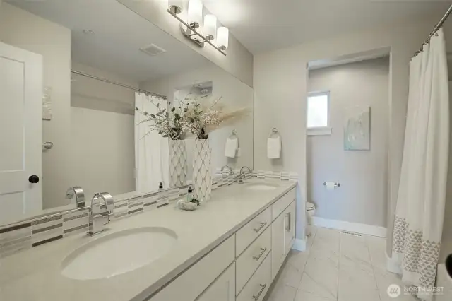 Double sinks for the shared bath.