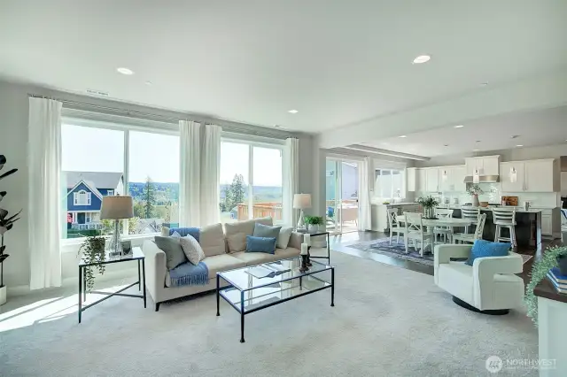 Great room concept. Open and spacious with wonderful natural light.