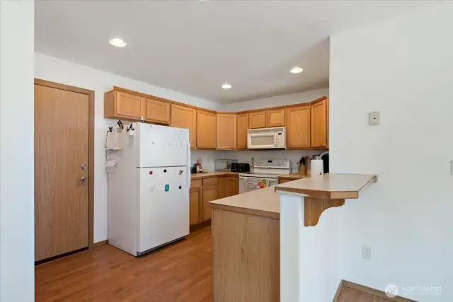 Kitchen offers large pantry, open floor concept, close to deck to BBQ!