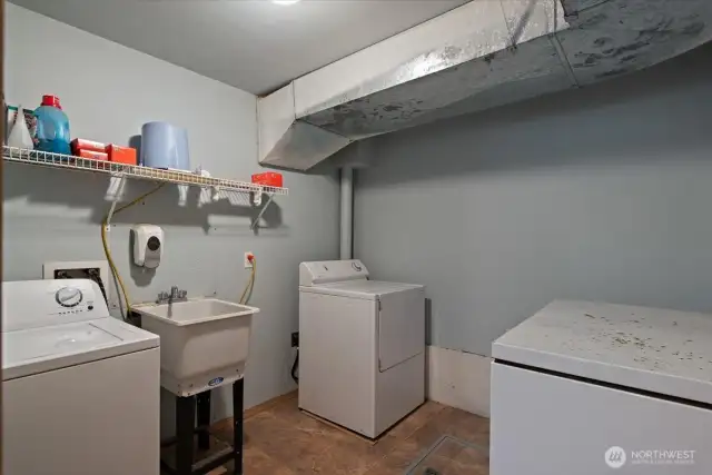 Spacious utility room in lower level