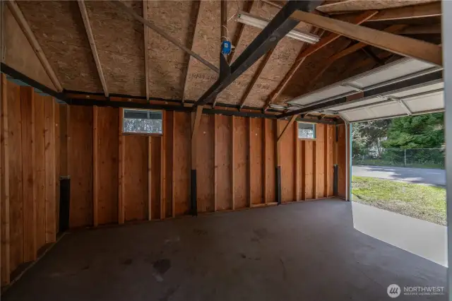 Interior of garage, has lights and outlets
