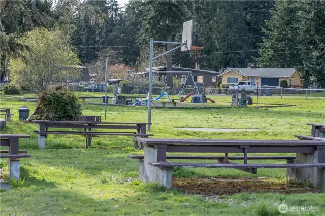 Lynch Cove Beach front park- picnic tables and playground with basketball half court