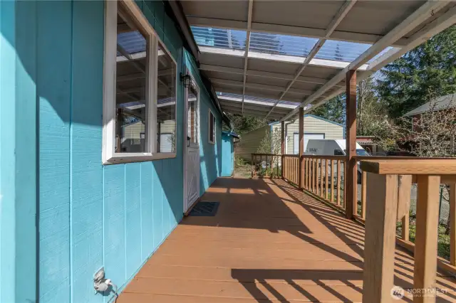 Front porch and front door- wonderful covered porch with skylights to let in the extra light