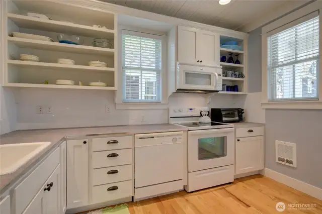 To the right of this picture there is a back door that leads to the two car parking space and outdoor storage shed.