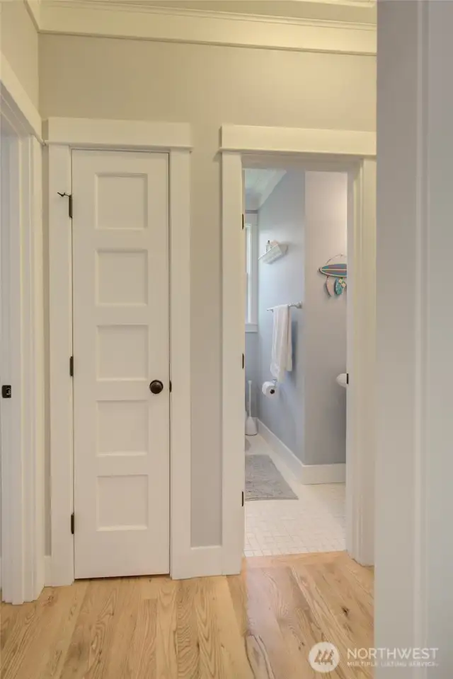 Down the hall are two bedrooms and two baths.