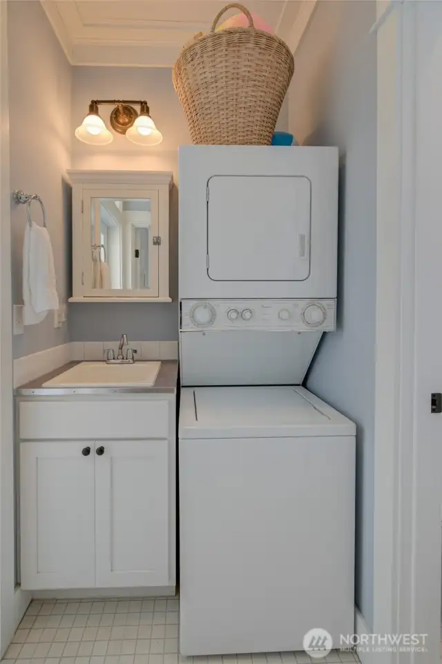 The back bathroom has direct access to the back porch for quick access after a day on the sandy beach.