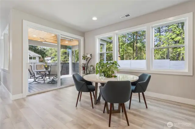 Dining area leads out to the outdoor lounge space