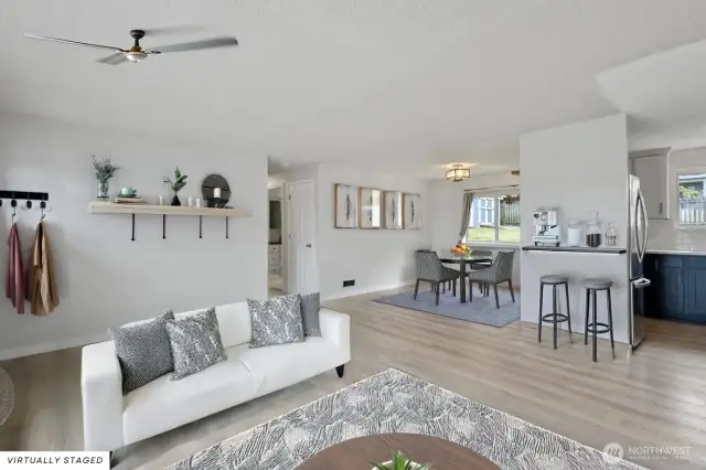 Lots of open space. Hallway heads towards the bedroom areas.
