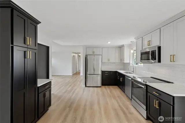 The updated kitchen is a dream with loads of kitchen, counter and pantry space.