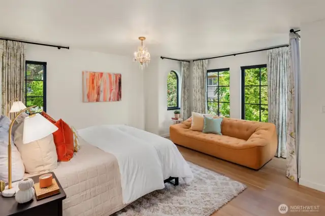 The generous 3 secondary bedrooms can be separated from the primary suite by a pocket door divider to create two private wings, ideal for guests or family.