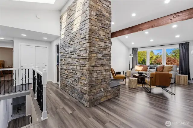 Full height stone wrapped fireplace