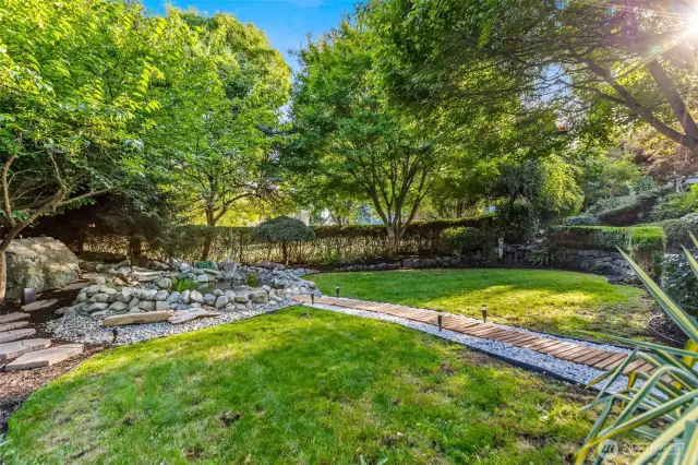 Large soothing pond w/ waterfall & fountain