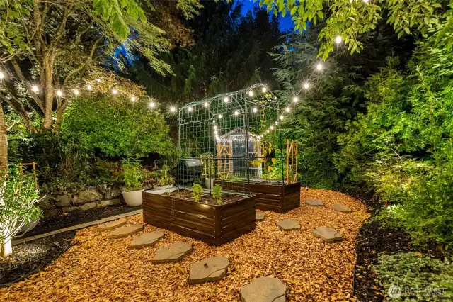 Raised garden beds w/ potters shed including fan & watering system