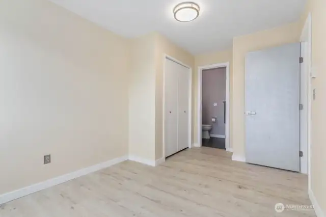 Perfect for family or guests, the second bedroom offers its own private 3/4 bathroom for added comfort and convenience.
