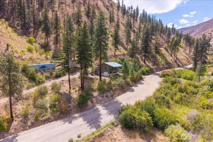 Aerial view. Cabin sits right off Mills Canyon Road.
