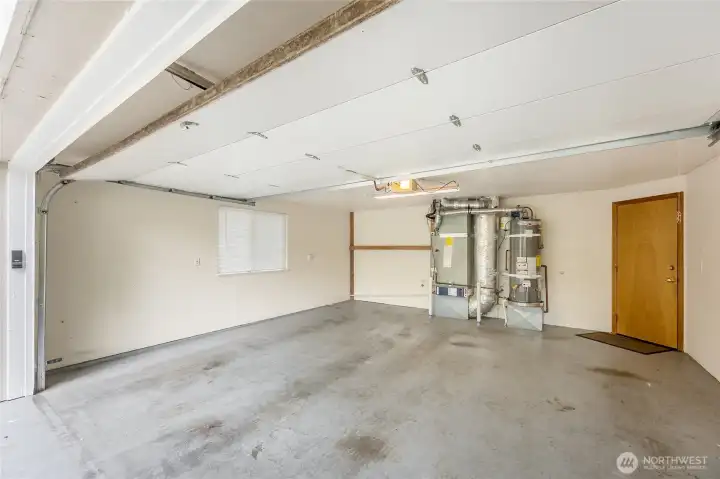Ample 2-car garage with clean, finished interior.