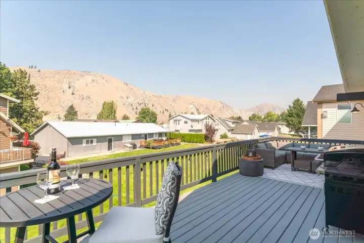 Gorgeous view off of deck! Sit here and enjoy the music from the summer concerts while enjoying the sunset over the hills.
