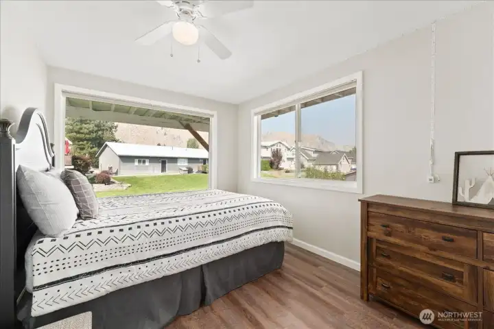 This big bedroom extends farther than photo shows, private as it sits on the lower level and is right next to the full bath!