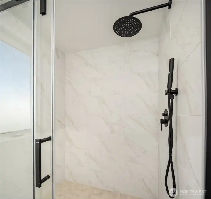 Large walk-in shower in the primary suite