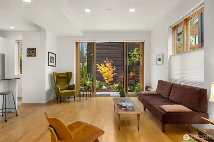 Local ash hardwood floors on the main and upper levels offer timeless beauty and warmth.