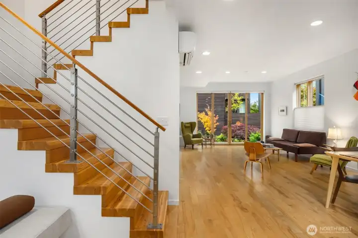 The staircase up features striking design while staying clear of everyday foot traffic.