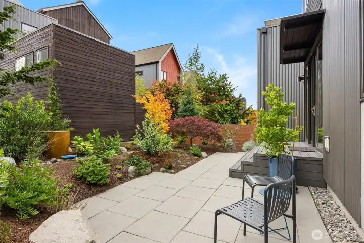 The wide garden patio invites daily visits to this calm and contemplative space.