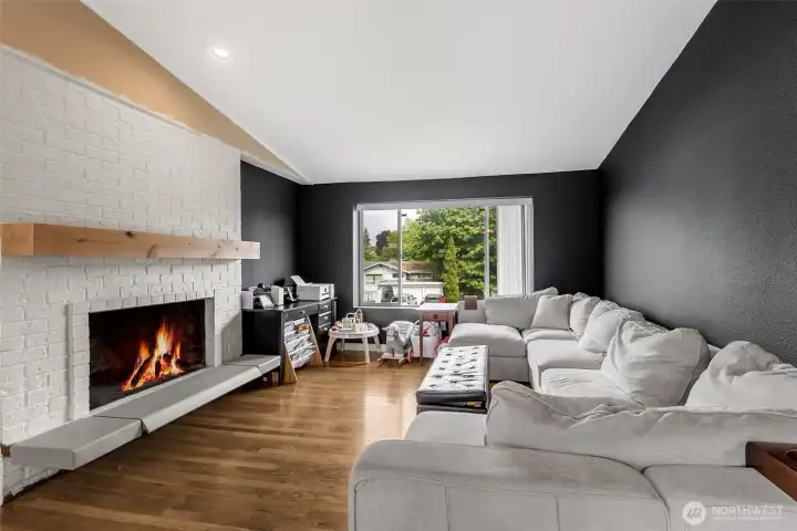 Cozy Living Room with Wood-burning Fireplace