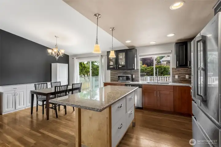 Open Concept Kitchen/Living/Dining; Dining Room with Slider to Deck