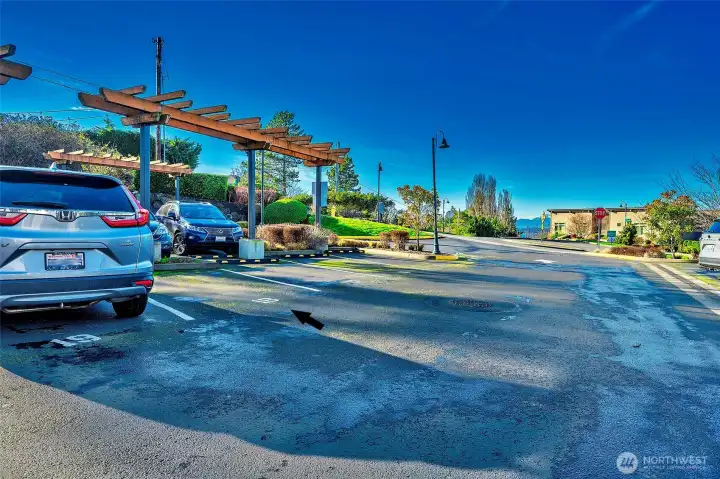 Designated parking space #18 near building entry.