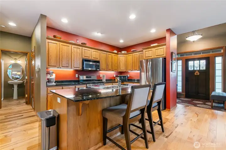 The spacious island offers ample seating—perfect for entertaining guests or enjoying a quiet morning coffee.