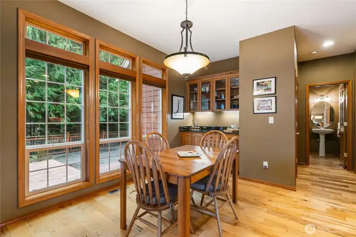 In the distance is the 3/4 bathroom and behind the built-in hutch is the main floor bedroom.