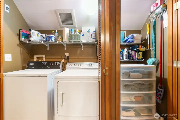 Upstairs Laundry area with double doors.