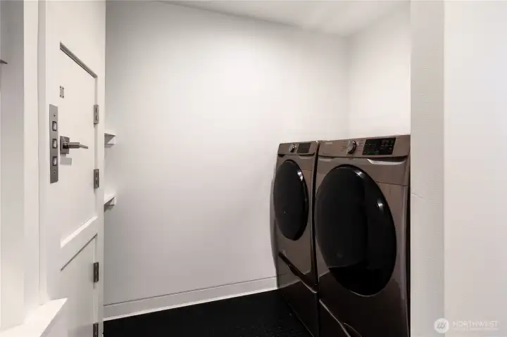 Laundry room with grocery elevator