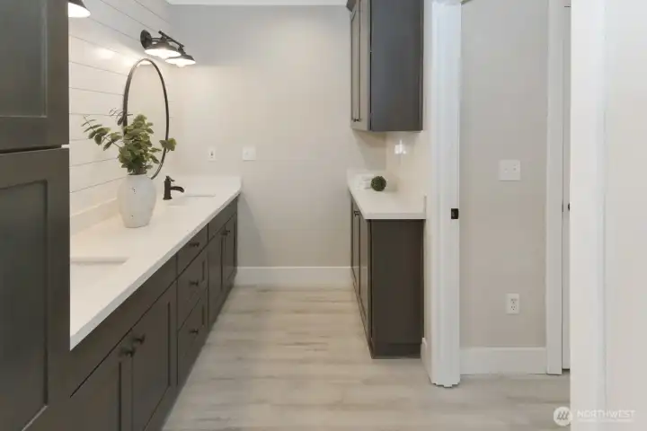 Primary en-suite bathroom with beautiful tile shower