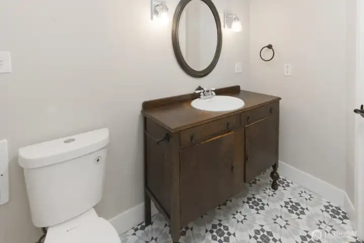 Upstairs bathroom with tub