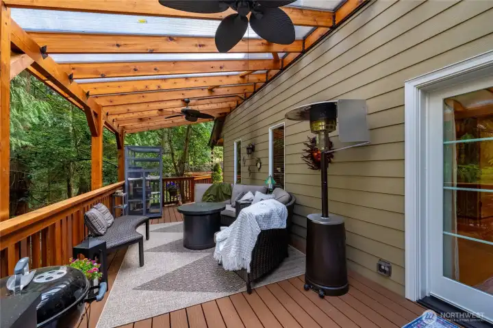 New CrystaLite cover runs length of home and lets in the natural light.  The composite decking is durable and easy to maintain.  New French Doors into dining area.