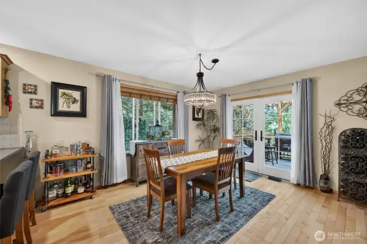 Well sized dining area with beautiful new French doors to covered outdoor living area.
