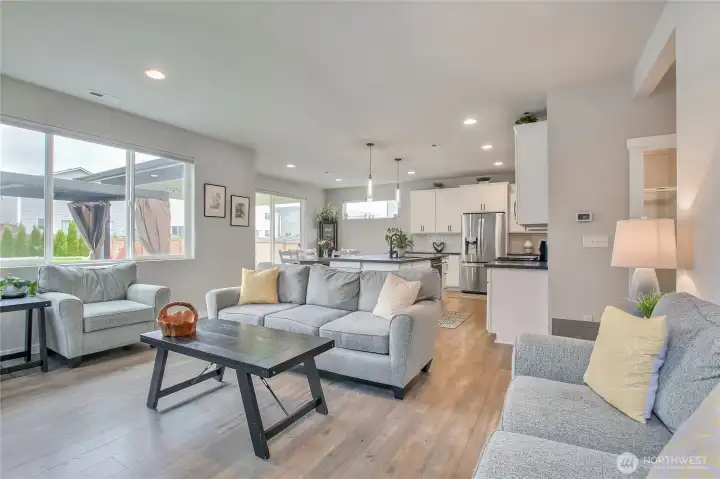 An abundance of natural light floods the main living area.