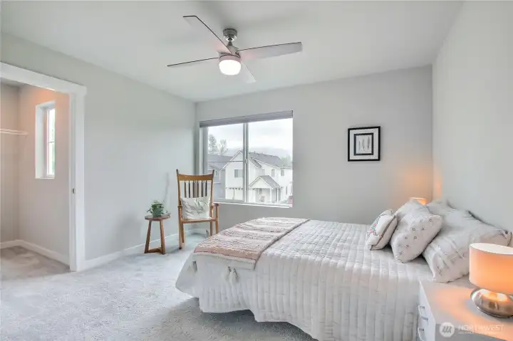 The large upper-level bedroom with oversized closet.