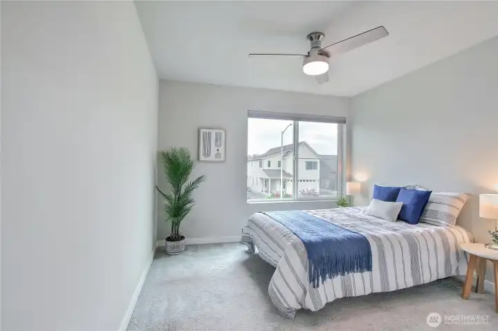 The spacious upper-level bedroom.