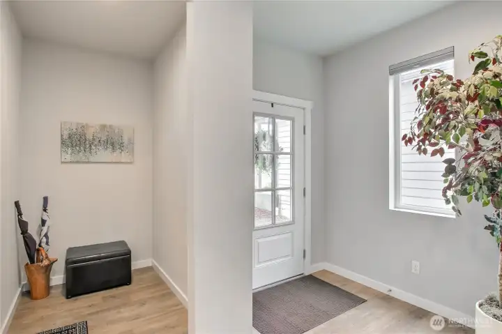 The main entrance to the home is next to the mudroom.