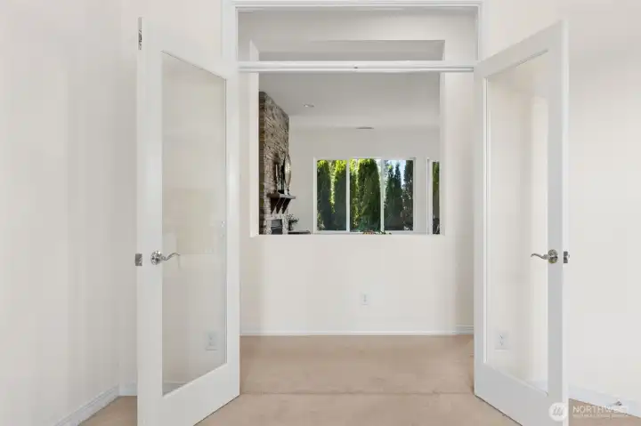 Glass French doors with transom